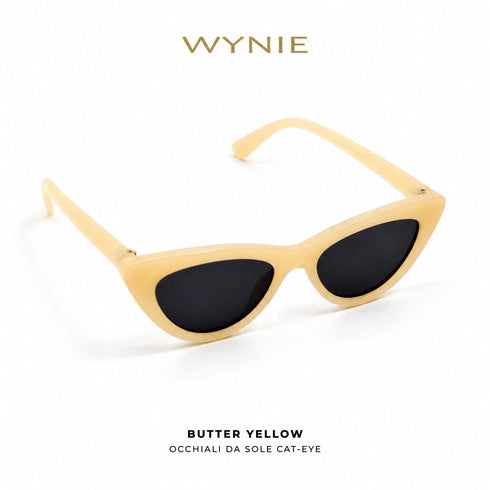 Butter Yellow | Occhiali da Sole Cat-Eye WYNIE Giallo Pastello, aperti e posizionati in diagonale