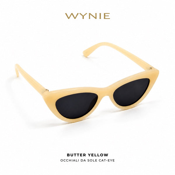 Butter Yellow | Occhiali da Sole Cat-Eye WYNIE Giallo Pastello, aperti e posizionati in diagonale