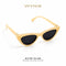 Butter Yellow | Occhiali da Sole Cat-Eye WYNIE Giallo Pastello, aperti e posizionati in diagonale