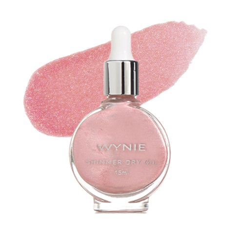 Olio secco illuminante rosa con riflessi rosso-arancio, finish caldo e luminoso per viso e corpo